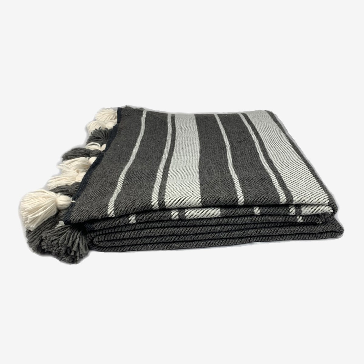 Couverture tissée en laine finitions pompons