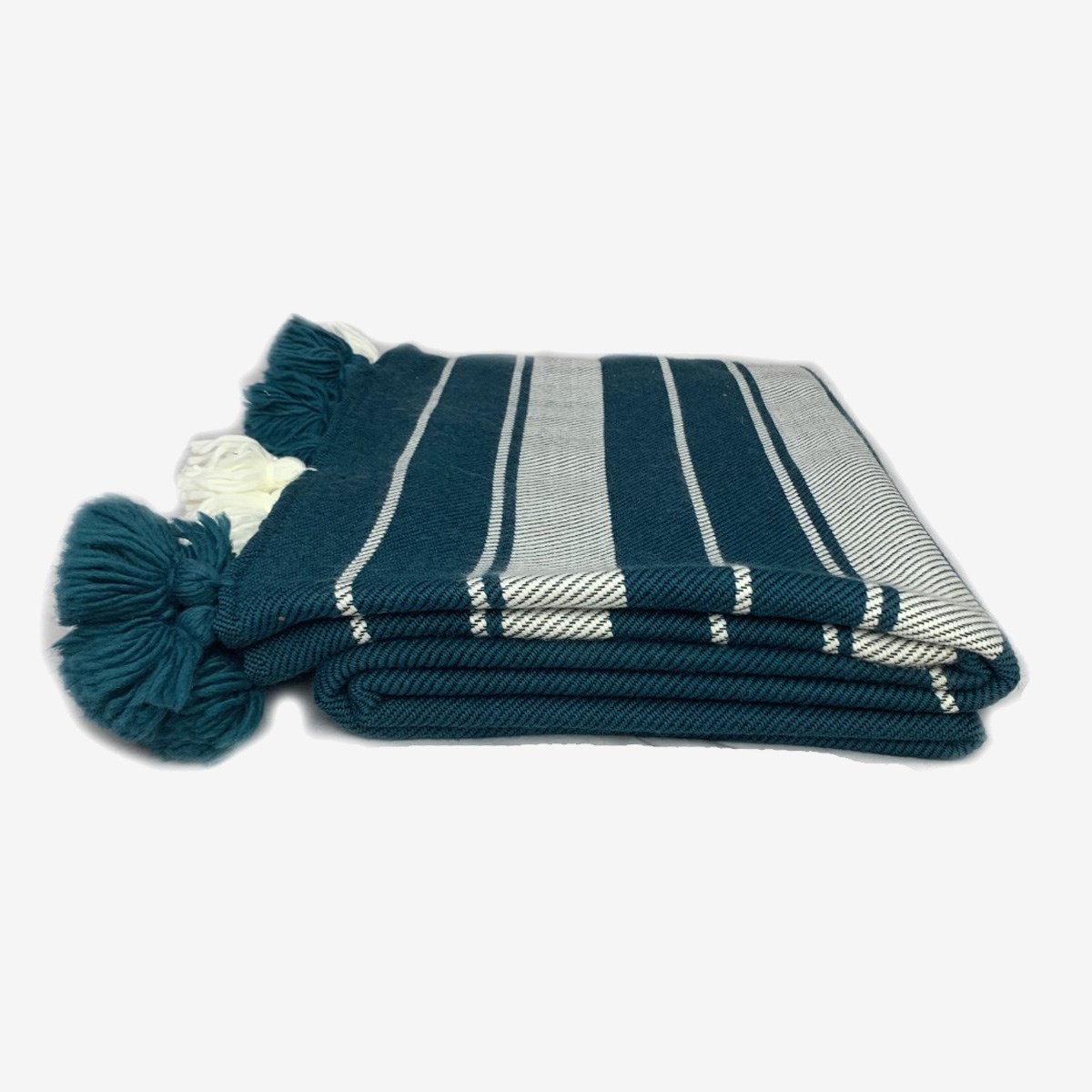 Couverture tissée en laine finitions pompons