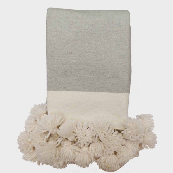 Plaid laine finitions pompons tissé à la main